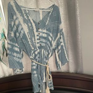 Button up Romper with optional belt.